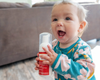 Kylie holding goat milk liquid foamer bottle