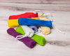 pile of various color Soap Savers on wood surface