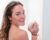 Jade holding goat milk shampoo & light conditioner bar