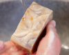 hand holding mega bar of Lavender Peppermint soap