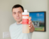 Hewitt holding liquid soap refill bottle