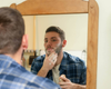 Emery lathering Goat Milk Shaving Soap into his beard