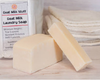 Goat Milk Laundry Soap Standard, Laundry Bar, and Stain Stick on wood surface