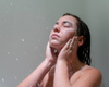 Washing face using goat milk soap