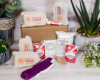 Collection of beauty products and packaging on a white background