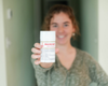 Indigo holding natural goat milk deodorant