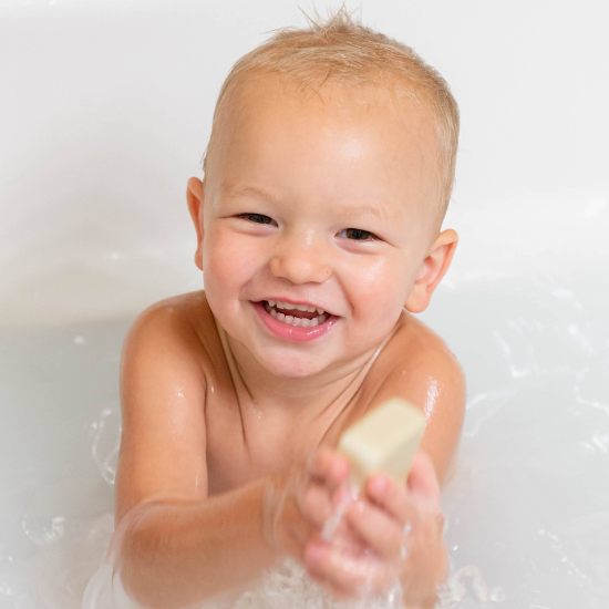 Michael in tub with goat milk soap