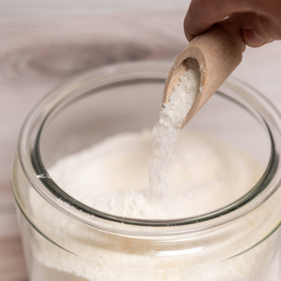 laundry scoop of natural goat milk laundry powder