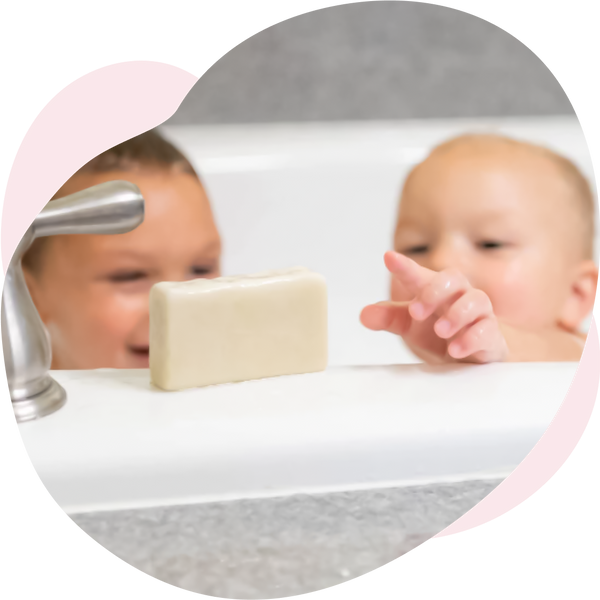 Landon and Michael in tub with goat milk soap