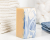 white bar with blue swirl standing on end