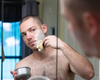 Fletcher using shaving brush to lather his beard