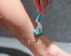 shaving leg with a shaving razor