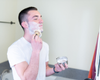 Greyden applying shaving soap lather to his face 